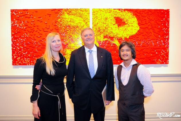 Artists Claire Healy and Sean Cordeiro flank Australian Ambassador Kim Beazley.